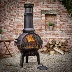 Deuba Chimenea De Terraza Brasero Exterior Estufa Puerta Con Cerradura Compartimiento Cenizas 28kg 112cm Estilo Rústico -Elrincon del Jardin Tienda 18458749 3